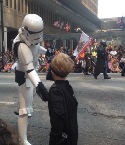 Picture of the author's son Skywalker in a Darth Vader costume shaking hands with a Stormtrooper with the caption 