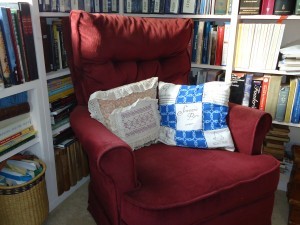 Smocked pillow made by my sister Nancy' Seaward Born pillow quilted by young fan