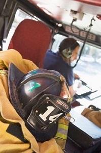 firefighter praying medic