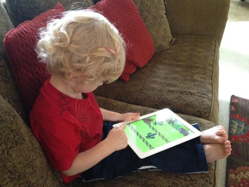 Baby Spawn and his iPad.