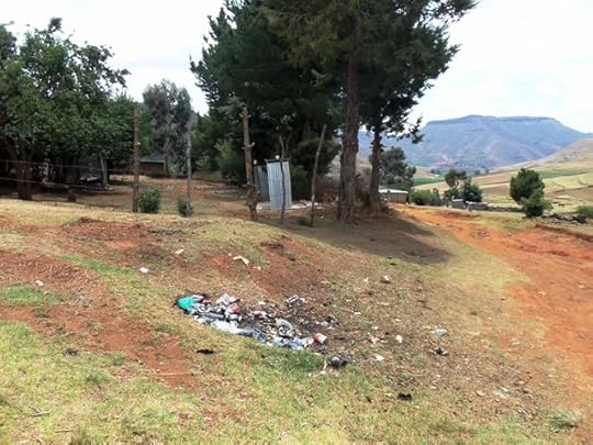 Where I burn my trash, and silver door is my toilet