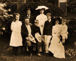 1903 --- A portrait of Theodore Roosevelt (1858-1919) with his family in 1903, prior to his election to President in 1904. His oldest daughter Alice stands at the rear. He is serving out the term of his predecessor, William McKinley, assassinated in 1901. Roosevelt's most durable achievments include reform of trusts, clean food, and the national park system. --- Image by © CORBIS