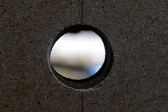 View through the hole I cut through some pieces of particle board to use testing SteelyKid's balsa-wood structure for OM.