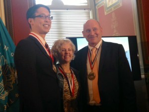 Kate DiCamillo, Jon Scieszka, and me. For some reason, Jon's medal is waaay heavier than Kate's and mine.
