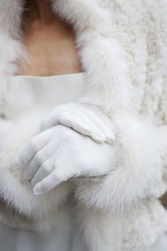 white fur gloves