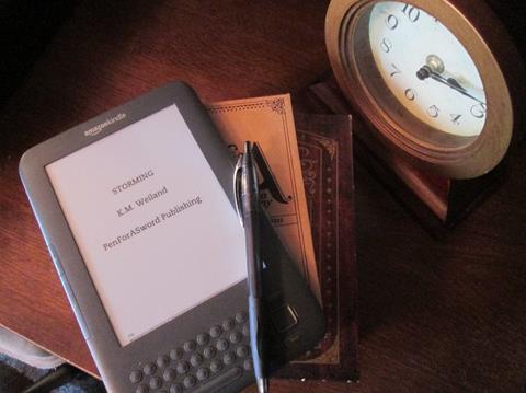 Kindle Keyboard Reading Storming by K.M. Weiland