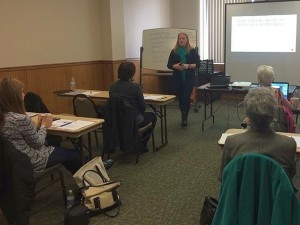 Picture of Author M.J. Pullen teaching a self-publishing workshop for writers