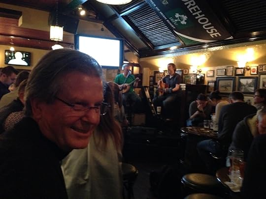 At a pub listening to traditional Irish music.