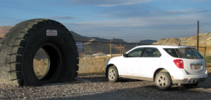 How does a mine move so much dirt? Here's my car next to a mine truck tire.