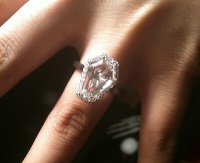 coffin gem surrounded with diamonds ring