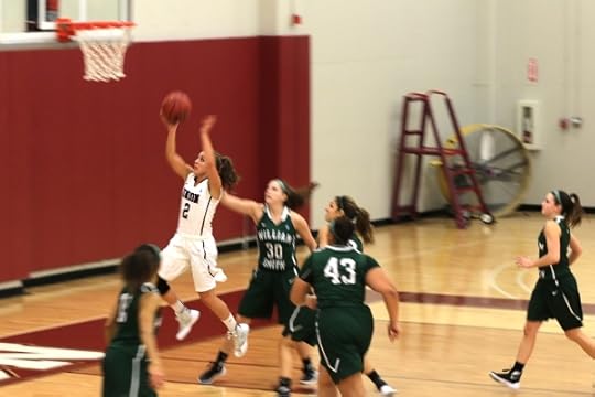 Union's Amy Fisher drives in for a lay-up.