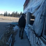 Konn Lavery at a abandoned gas station on the side of a highway Canada