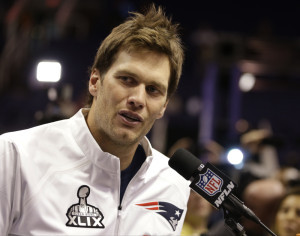 New England Patriots' Tom Brady answers a question during media day for NFL Super Bowl XLIX football game Tuesday, Jan. 27, 2015, in Phoenix. (AP Photo/Mark Humphrey) ORG XMIT: NFL108