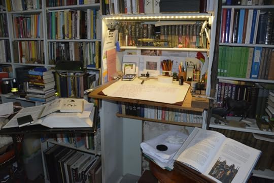 Standing desk with the first pages scribbled in Syrah from Diamine