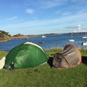 Camping at amazing Home Bay on Motutapu Island, Auckland