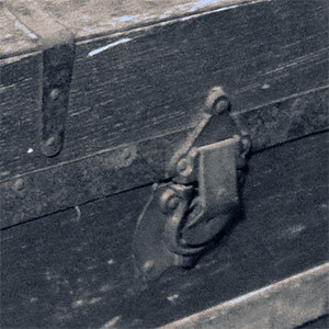 a latched steamer trunk representing the troubles of 2015 and the stored-up potential of 2016