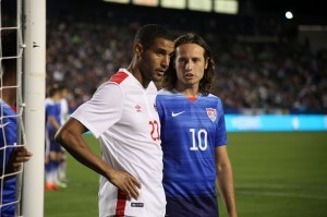Canada's Tesho Akindele lines up against American Mix Diskerud in Carson, Calif. Friday night. PHOTO: CANADA SOCCER