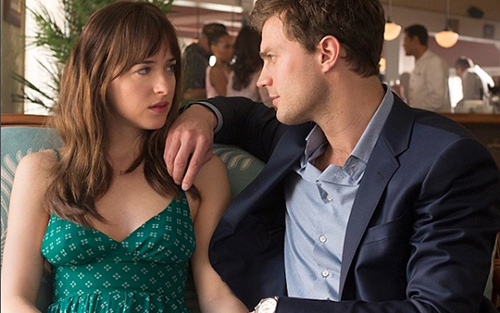 Jamie Dornan as Christian Grey and Dakota Johnson as Anastasia Steele