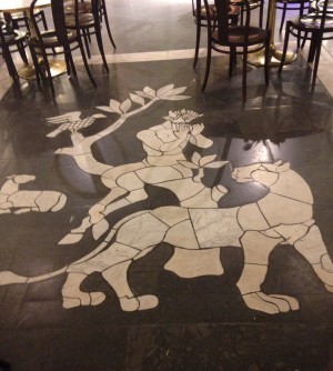 Inläggning i golvet - Guden Pan och en leopard.