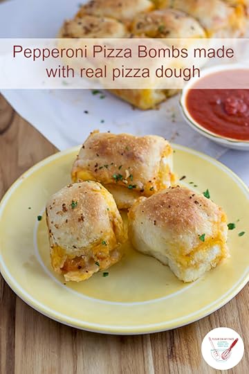 Pepperoni Pizza Bombs made with real pizza dough via flouronmyface.com