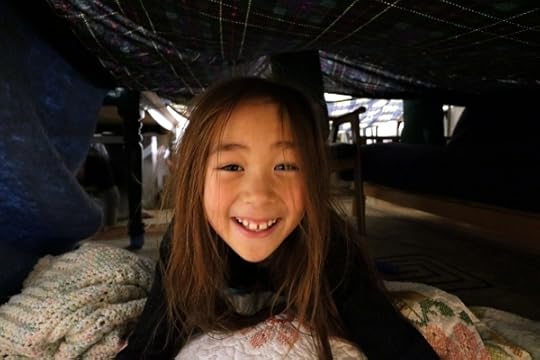 SteelyKid inside the basement blanket fort.