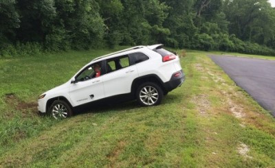 Hacked_car in ditch