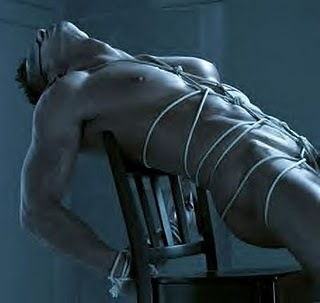 tied-to-a-chair-guy