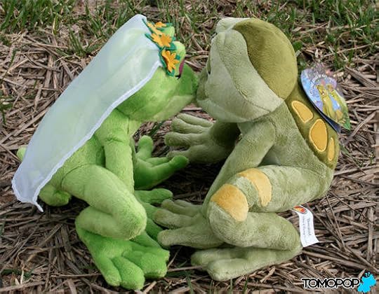 princess kissing a frog