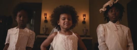 Blue Ivy in her mom's video. Rocking her afro after Beyonce was criticized heavily for not straightening her daughters hair.