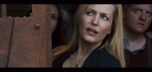 Laurence with Gillian Anderson, obeying the first rule of Extras Club: always latch on to the talent.