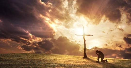 kneeling before the cross