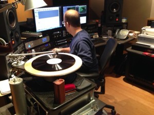 Audio Engineer Robert Cristarella preserves a lacquer disc of a BBC broadcast from the Alan Lomax Collection. Photo by Gene DeAnna.