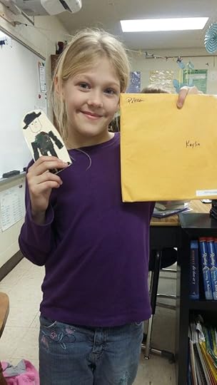 Kaylin holding her Oliver and the envelope Darcy Pattison sent her. | Mims House.com