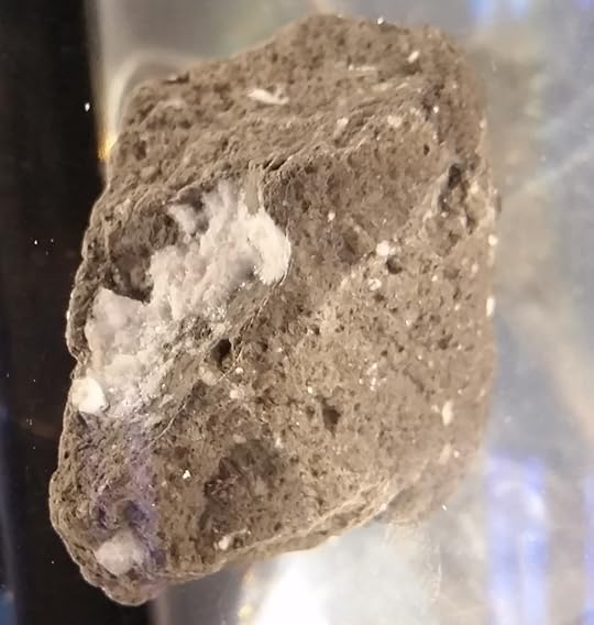 A moon rock collected and returned to Earth by NASA's Apollo mission.