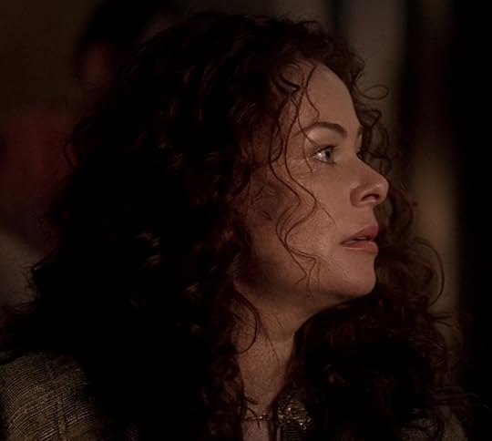 Atia's hair is loose and down and curly, like some kind of ancient goddess.