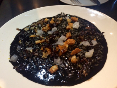 Squid ink risotto with sturgeon marrow.