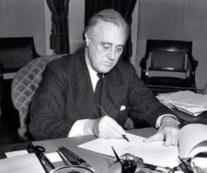 Pres. Franklin Roosevelt signing the Lend-Lease bill, 11 Mar 1941 (Library of Congress)