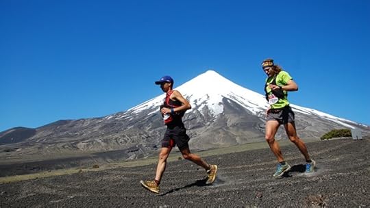 With the Osorno Volcano in the background, Spaniard Cristofer Clemente Mora and American Joe Grant run together in the lead of the Volcano Ultra Trail 100K race in Chile in early December. Photo: Horacio Lyon