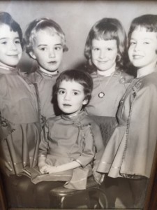 I suspect this photo was taken a year or two after the famous Irish-American Club party. I am seated. My sister SuEllen is the fair-haired girl second from left.