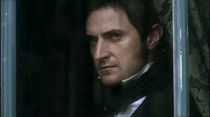 The more grim he looks, the better. Wouldn't be surprised if there was all kinds of BDSM fan fic about him.
