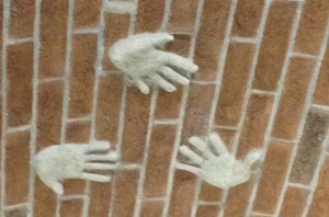 Handprints of the three Grasso sisters of Ca' del Baio - Paola, Valentina and Federica - on the roof of the newest addition to the winery. 