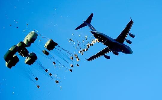aircraft drops pallets of water and food 959ae