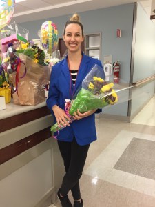 Kristin holding Sam Suarez's flowers