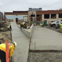 Finished sidewalks up to the main entrance.