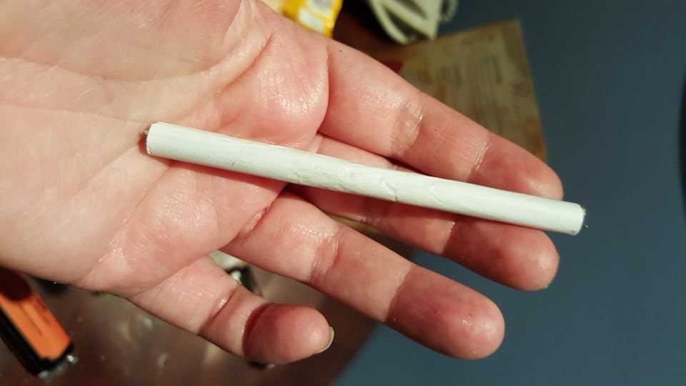 A joint in my open palm, reaching from the top of my middle finger to the middle of my hand.