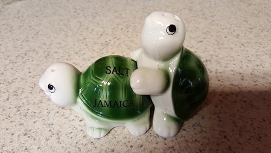 Ceramic salt and pepper shakers shaped like turtles. They fit together so as to suggest that they are humping.