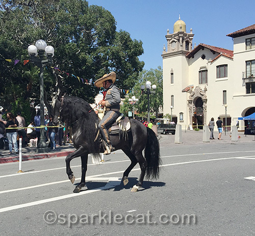 a horse with traditionally clad rider at Olvera Street