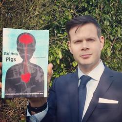 Author James Howell with his new book, Guinea Pigs.