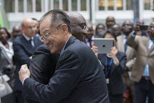 World Bank President Jim Yong Kim (right) embraces African Bank President Donald Kaberuka (Photo Credit: World Bank)