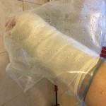 I discover a ziplock bag and alligator clip make a reasonably decent waterproofing solution for showering.